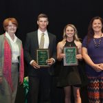 Henson, McDearmon Earn Falls and Tucker Awards Dr. Bowen stands with the Tucker and Falls award winners