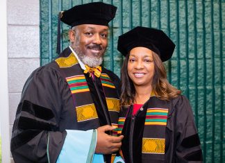 Whitfields Earn Doctoral Degrees Together The Whitfields pose together after the graduation ceremony