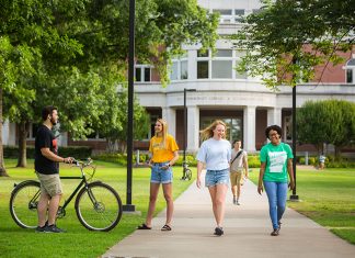 ATU Selected for Colleges of Distinction Honor ATU students walk across campus on a sunny day