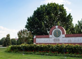 Colleges of Distinction Bestows Honor Upon Arkansas Tech University A landscape picture of the Arkansas Tech University sign found at one of the campus entrances.
