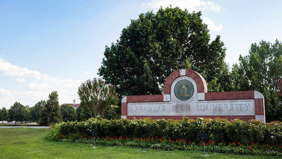 A landscape picture of the Arkansas Tech University sign found at one of the campus entrances.