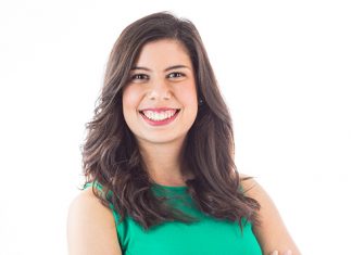 Student Stories: Emily Torrealba ATU student Emily Torrealba wears a sleeveless green top and bluejeans