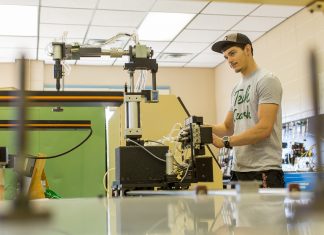 Stem @ ATU A student operates a mechanical arm