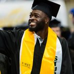 Many Paths, One Achievement: Summer Graduation Cua’ Rose waves to his family at the graduation ceremony