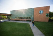 ATU-Ozark Procedures for Summer 2020 A student is seen walking toward an ATU-Ozark building