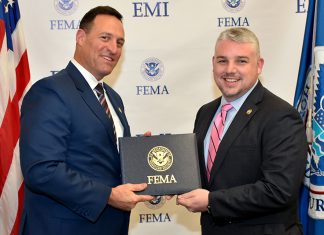 Stover Continues Education in Emergency Management Scott Kelberg and Chad Stover