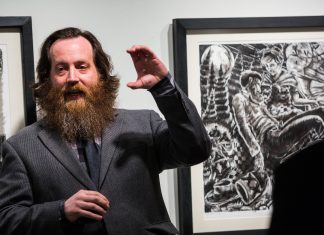 A Mother, a Son and a Work of Art Professor Neal Harrington speaks at a gallery opening