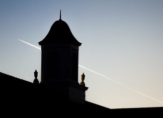 Architect Recommended for New Russellville Campus Entrance The silhouette of a cupola against an evening sky