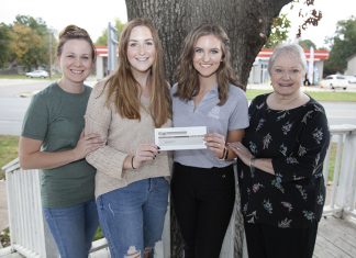 Duggan Named Hunger Hero, Donates $2,500 to Pantry Danielle Duggan G&G Cupboard Donation 10-28-2019