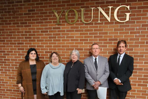 Young Family in Front of Young Building 2021