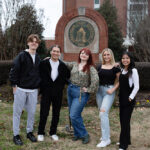 Fall Semester Classes Begin ATU Students in Front of Campus Entrance Sign 2024