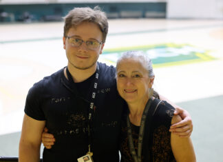 Son and Mother Represent AGS Present and Heritage AGS Opening Ceremony Feature Story 2024