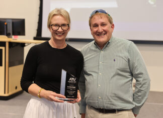 Nichols Recognized for Service to ATU at Reception Dr. Keegan Nichols and Dr. Russell Jones 3-11-2025