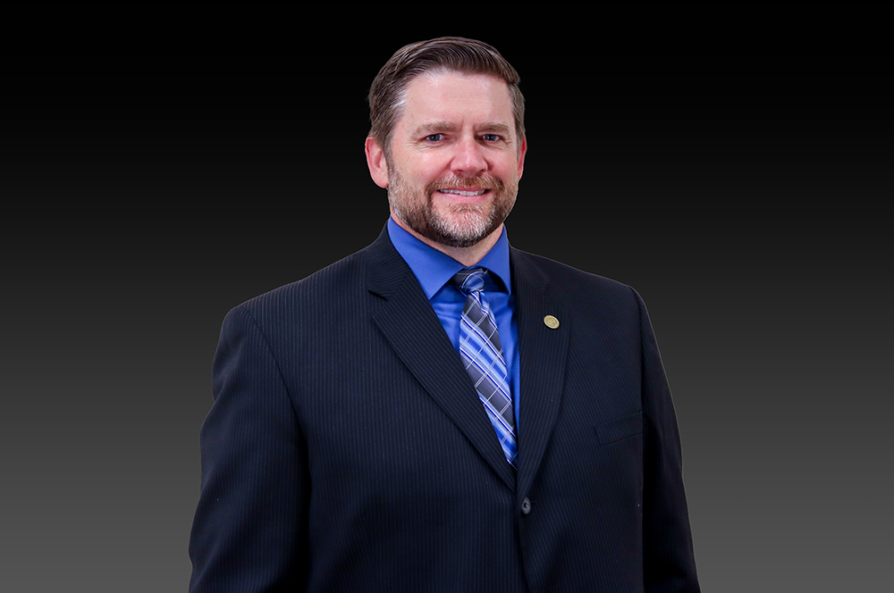 Dr. John H. Lewis Dr. John H. Lewis