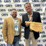 Bradley Conducts Interview at Statewide Conference Dr. Michael Bradley and John Gifford Fall 2025